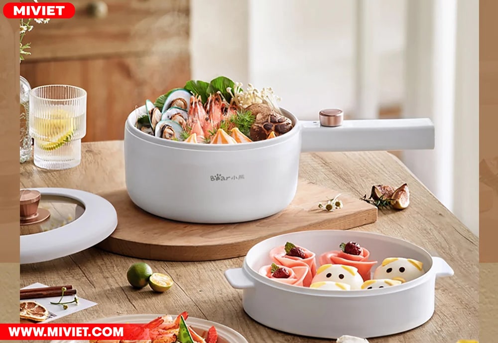 Nồi điện đa năng Bear DRG-P16M2 - Tiếng Anh - HDSD Tiếng Việt Thiết kế tay cầm dài dễ dàng trong các thao tác